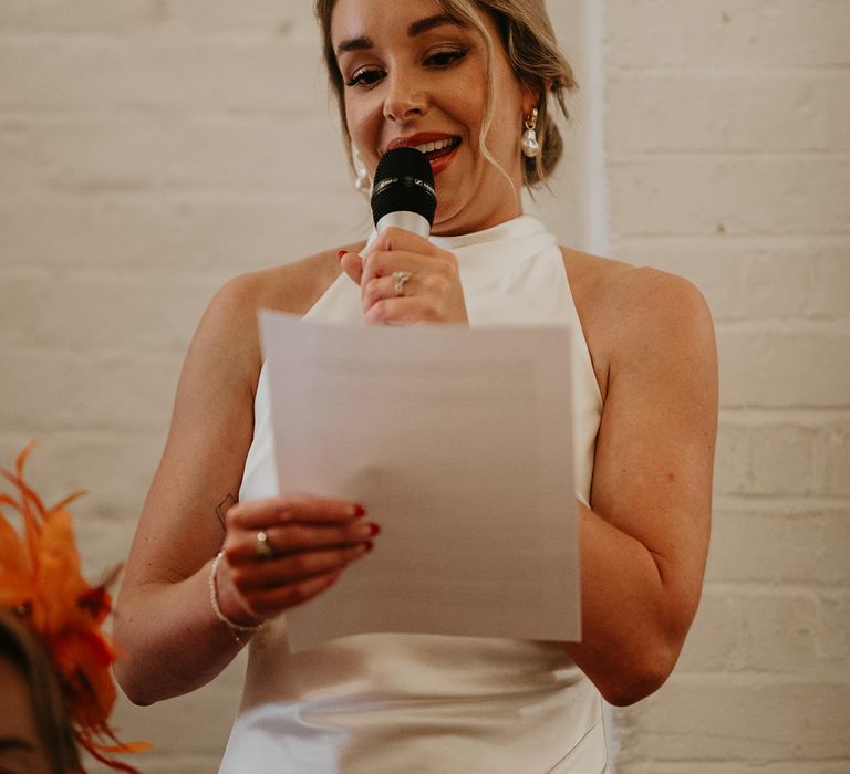 bride-reading-out-bridal-speech