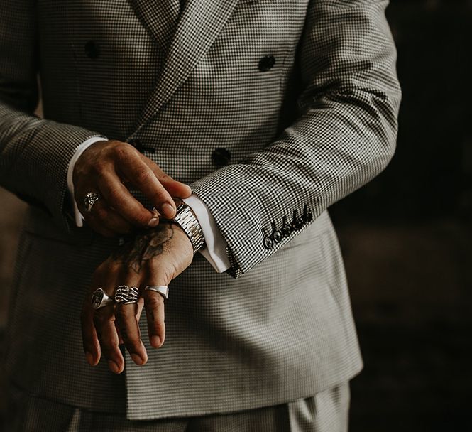 groom-wearing-smart-grey-wedding-suit-with-silver-watch