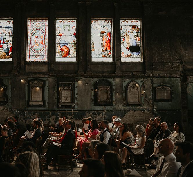 wedding-guests-seated-for-wedding-ceremony-at-asylum-chapel