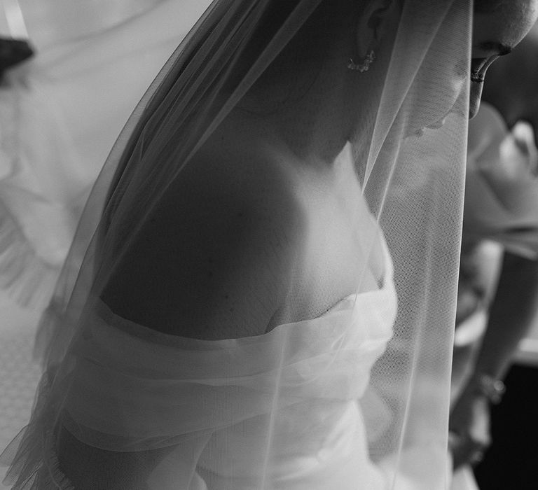 bride-wearing-bespoke-wedding-dress-and-veil