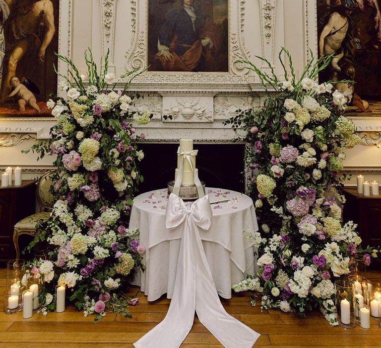 champagne-tower-wedding-venue-with-white-bow-details