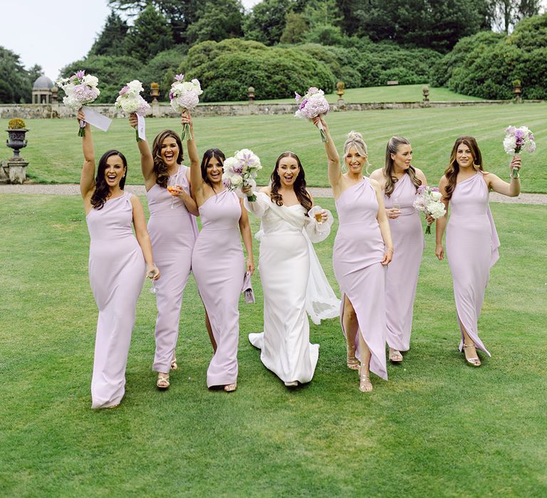 group-wedding-party-with-lilac-bridesmaid-dresses