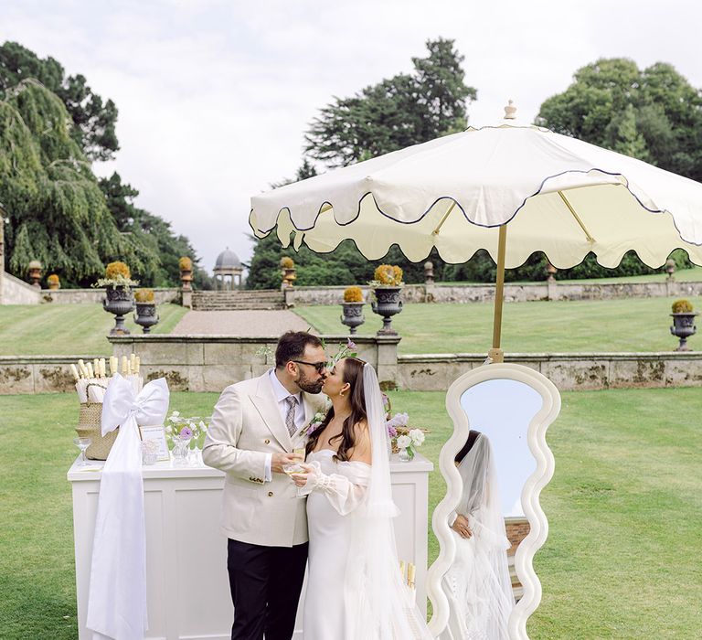 romantic-outdoor-champagne-garden-with-umbrella-and-bar