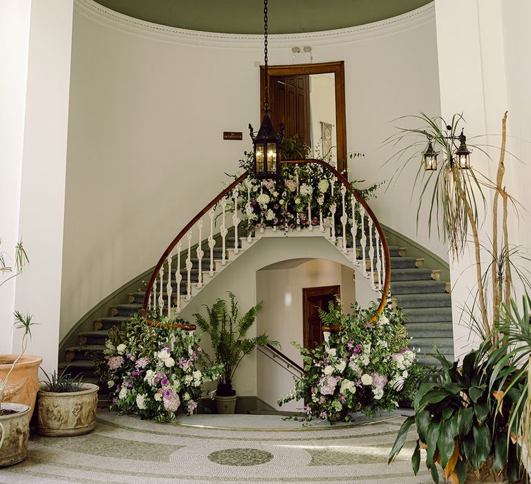 staircase-purple-wedding-flowers-at-hawkstone-hall