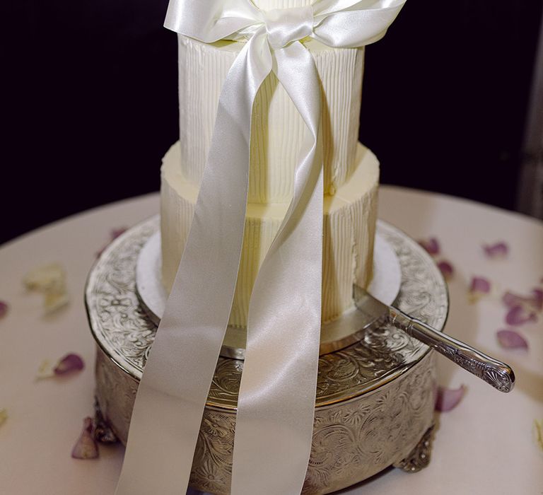 three-tier-white-wedding-cake-design-with-white-satin-bow