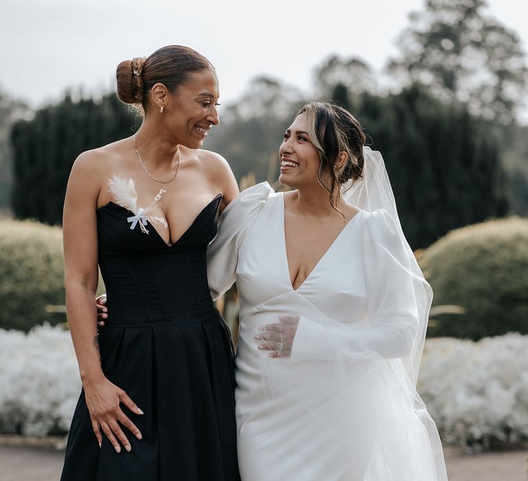 wedding-guest-and-bride-at-wedding-with-monochrome-theme