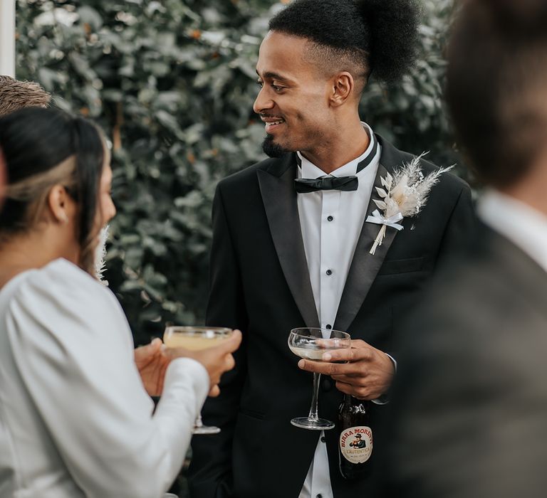 wedding-guest-wearing-black-tuxedo