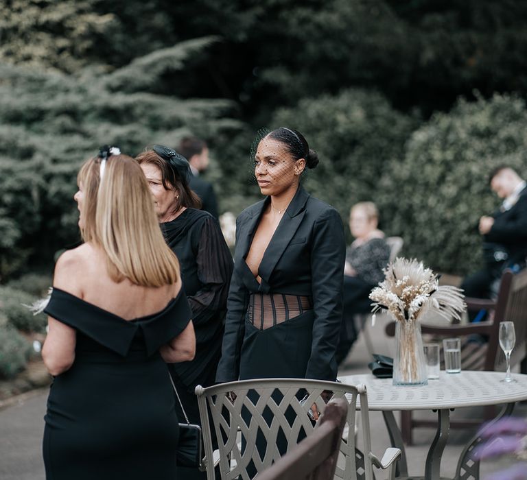 wedding-guests-wearing-all-black-blazer-dress