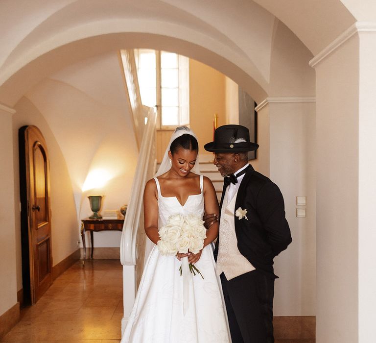 father-of-the-bride-poses-with-bride