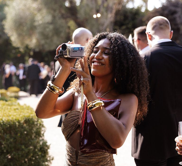 wedding-guest-with-video-camera