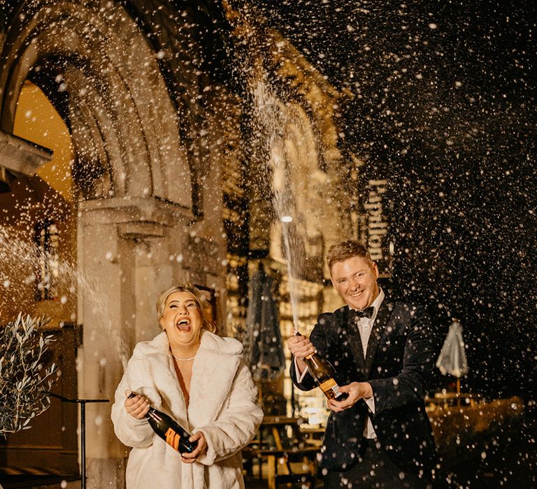 epic-champagne-spray-wedding-photo