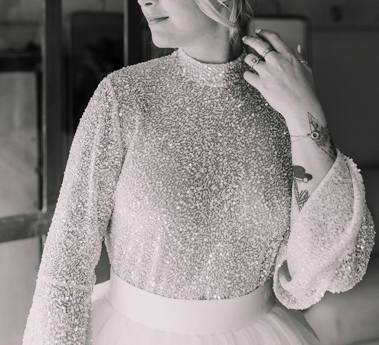 bride-wearing-sparkly-long-sleeve-diamante-bridal-top