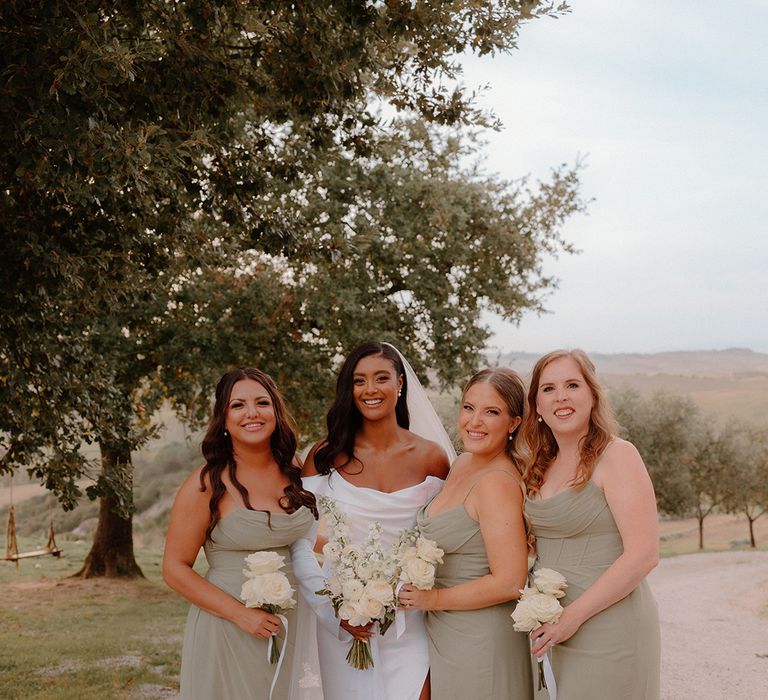 bridal-party-wearing-sage-green-bridesmaid-dresses