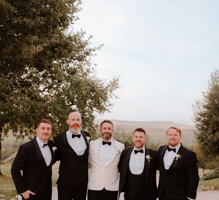 groom-and-groomsmen-in-tuxedo