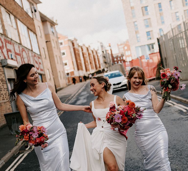 bridesmaids-in-silver-metallic-bridesmaid-dresses-with-bride