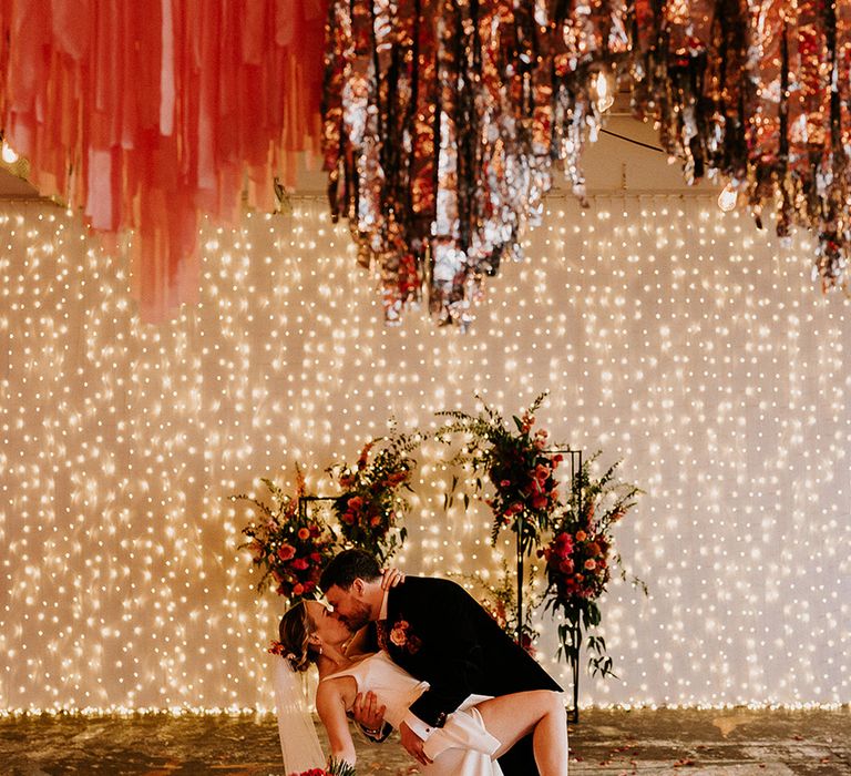 pink-and-gold-metallic-streamers-at-industrial-wedding