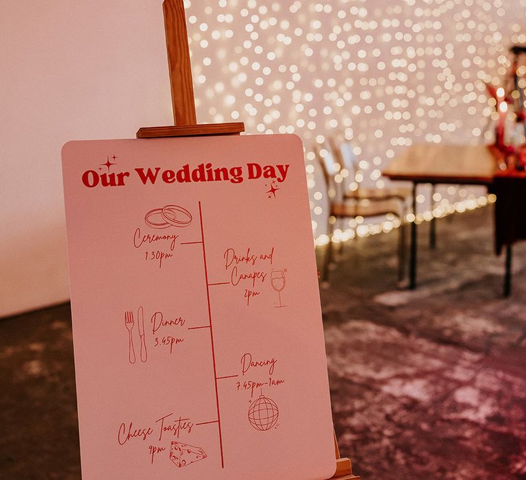 pink-order-of-the-day-wedding-sign