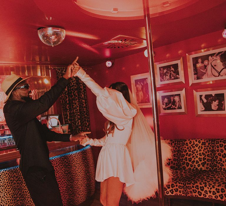 groom-dancing-with-bride-at-bar