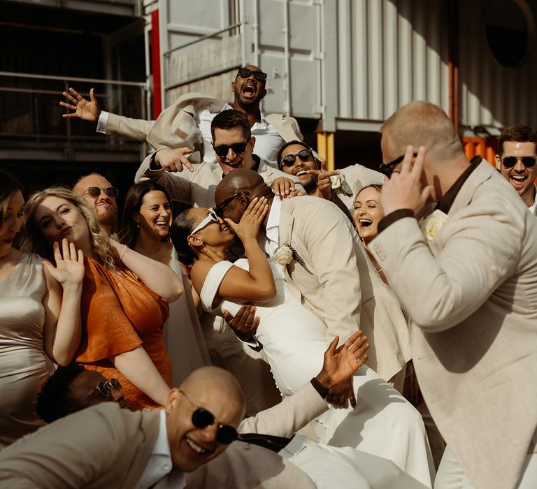 group-wedding-party-photo-with-sunglasses-at-fun-city-wedding