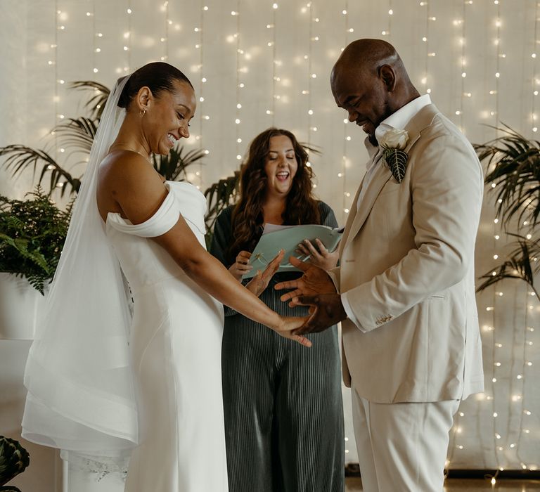 the-bride-and-groom-exchange-rings-at-humanist-wedding-ceremony