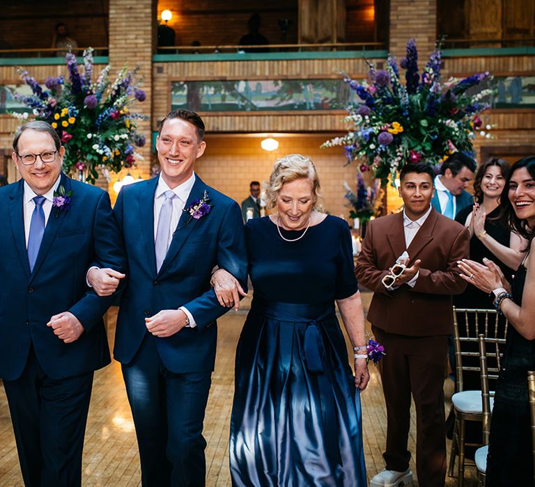 groom-walked-down-the-aisle-by-parents