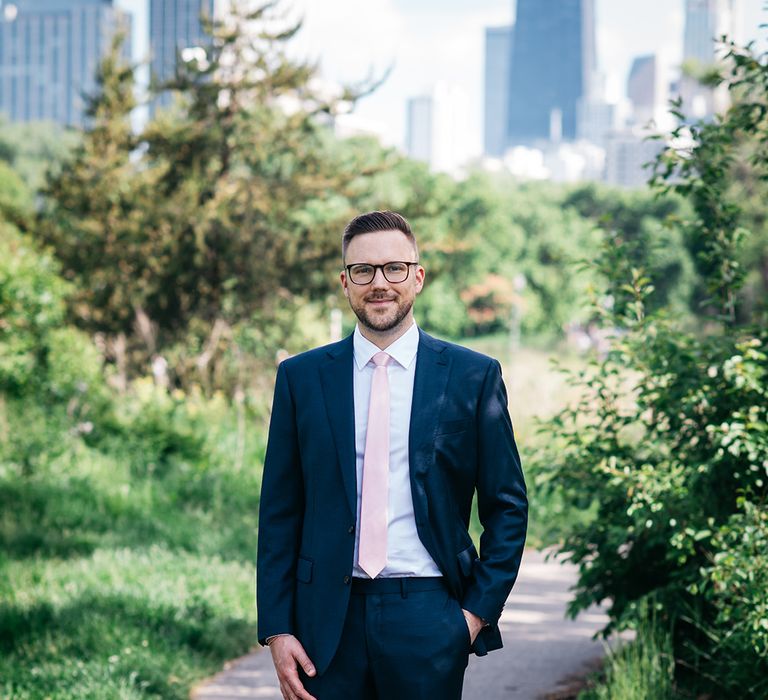 groom-wearing-dark-navy-wedding-suit