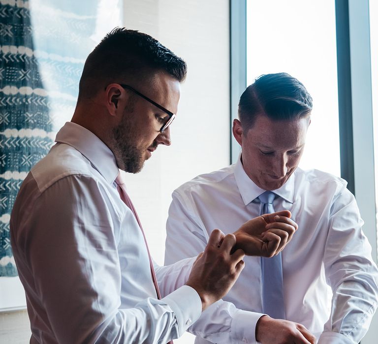 grooms-getting-ready-for-same-sex-wedding-ceremony