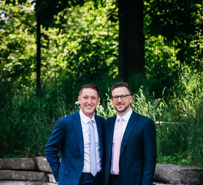 two-grooms-in-navy-wedding-suits