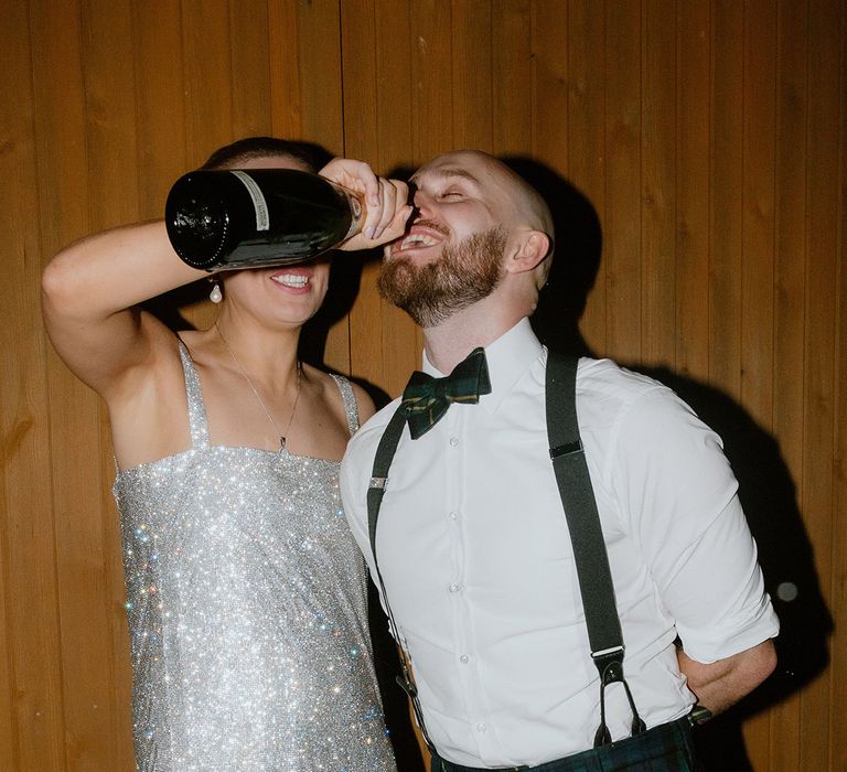 bride-pours-champagne-for-groom