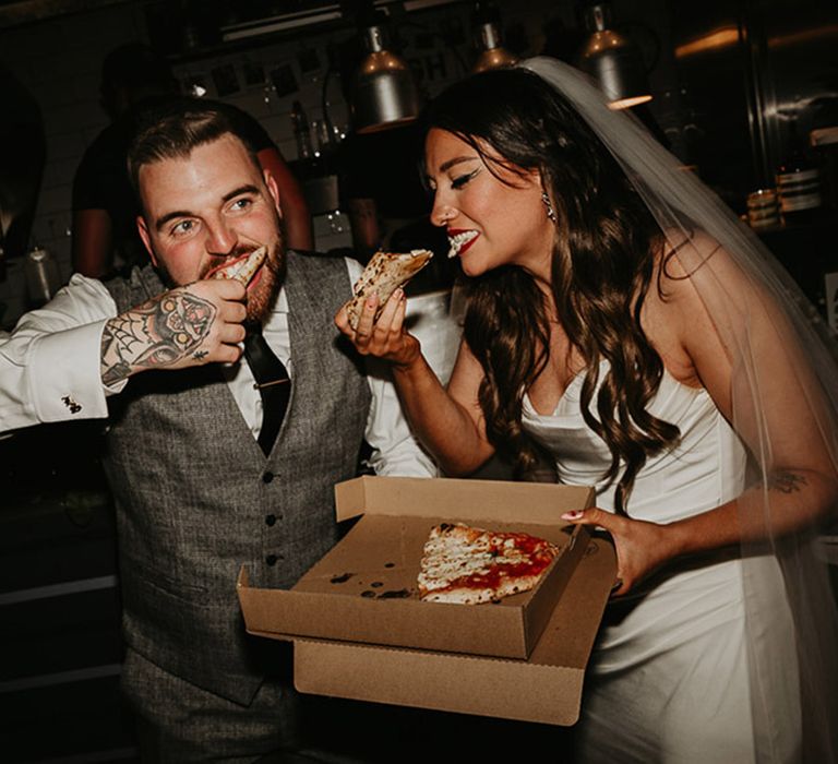 bride-and-groom-eating-pizza-evening-food