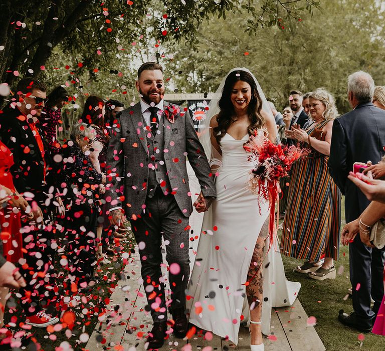 colourful-pink-confetti-moment-for-bride-and-groom