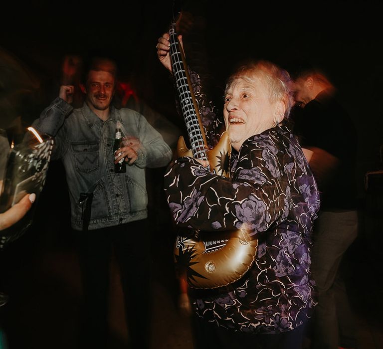 nan-playing-blow-up-guitar