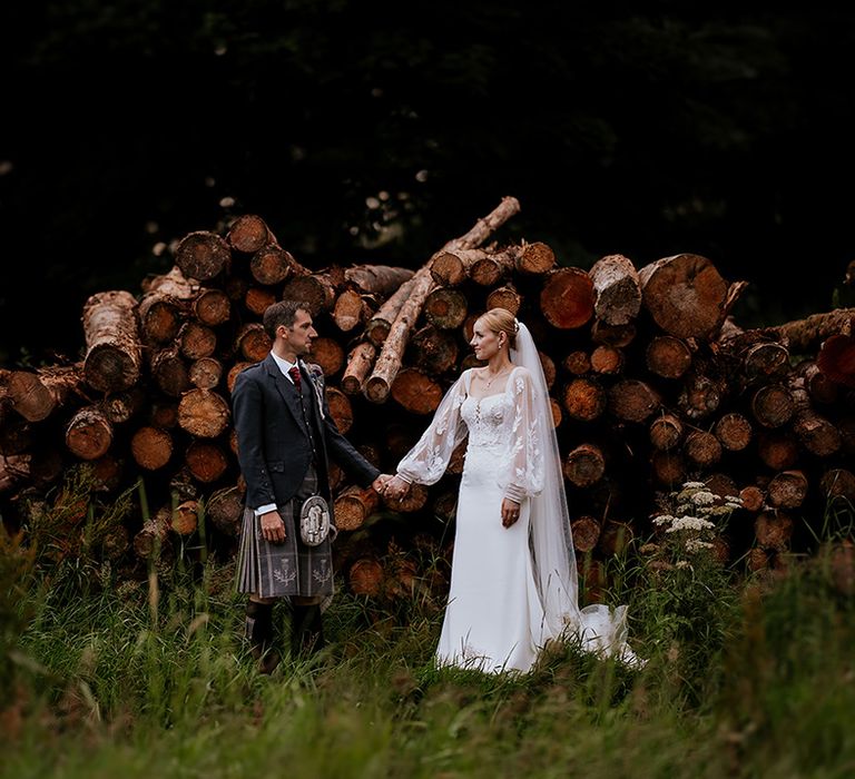 bride-and-groom-holding-hands-at-intimate-wedding