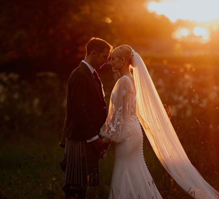 bride-and-groom-sunset-golden-hour-portrait