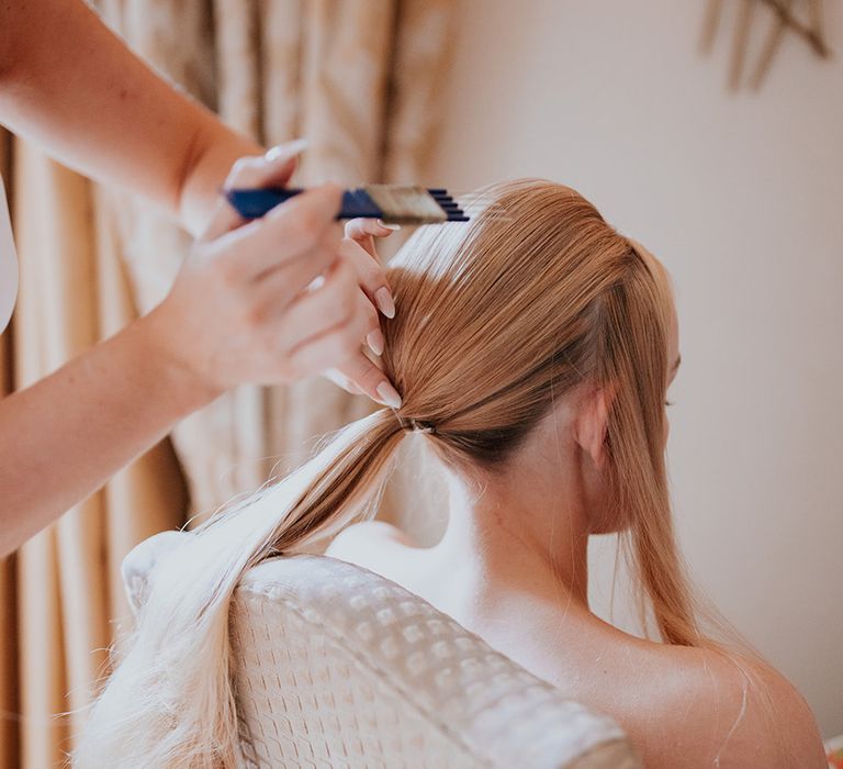 bride-gets-hair-done-for-wedding-day