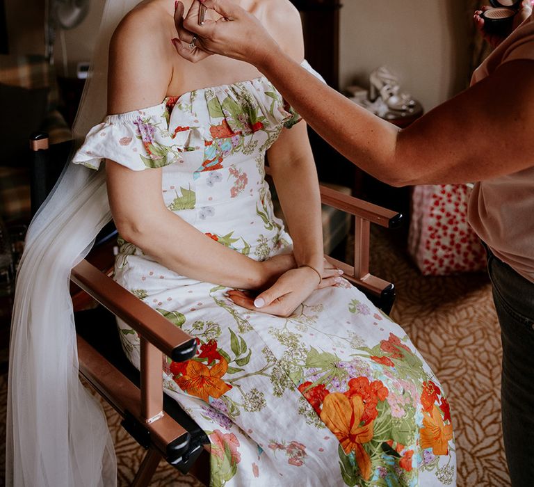 bride-gets-makeup-done-for-wedding-day