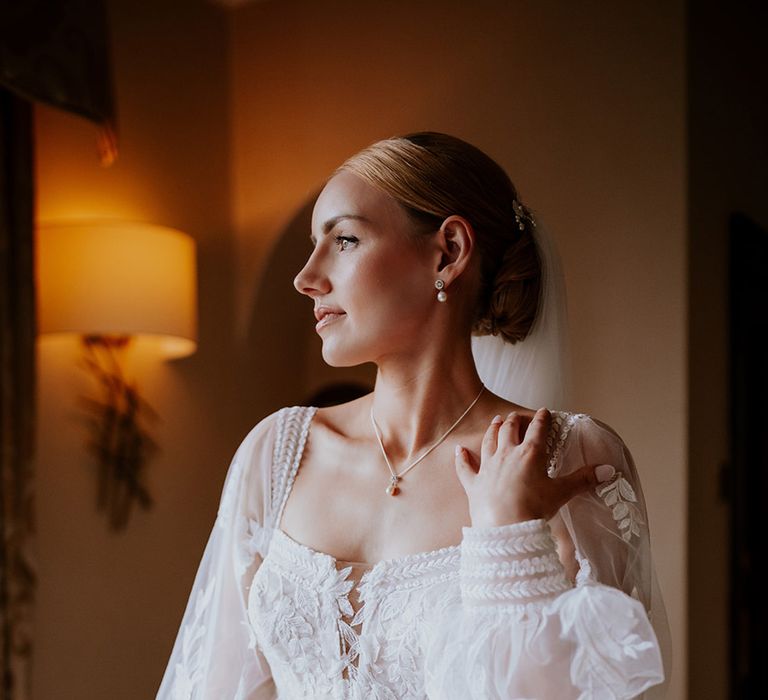 bride-in-sheer-long-balloon-sleeve-wedding-dress