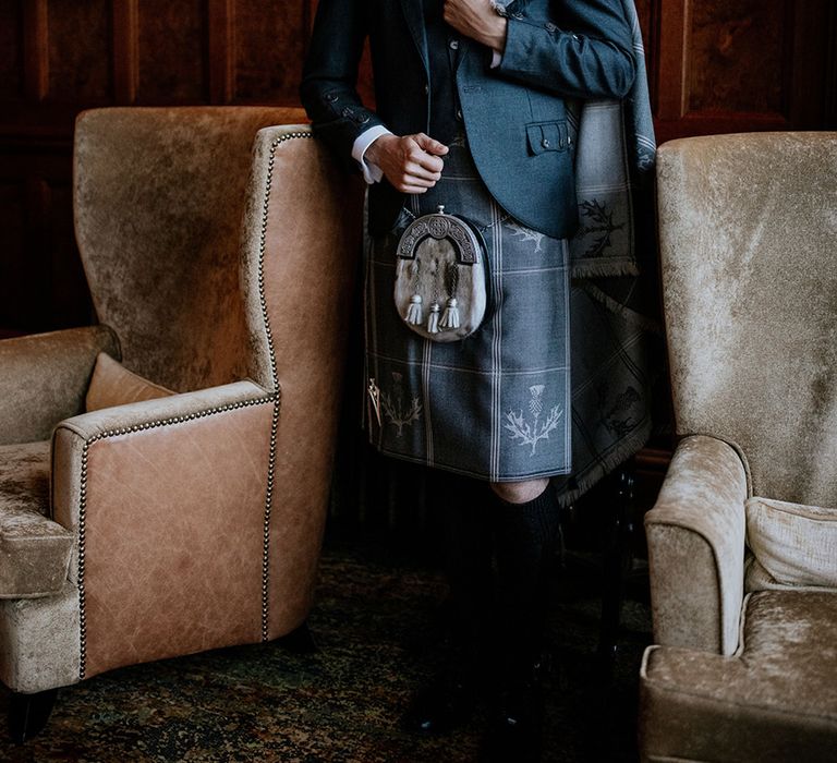 groom-wearing-suit-and-kilt-for-traditional-scottish-wedding