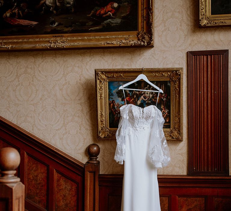 wedding-dress-on-hanger-at-traditional-wedding