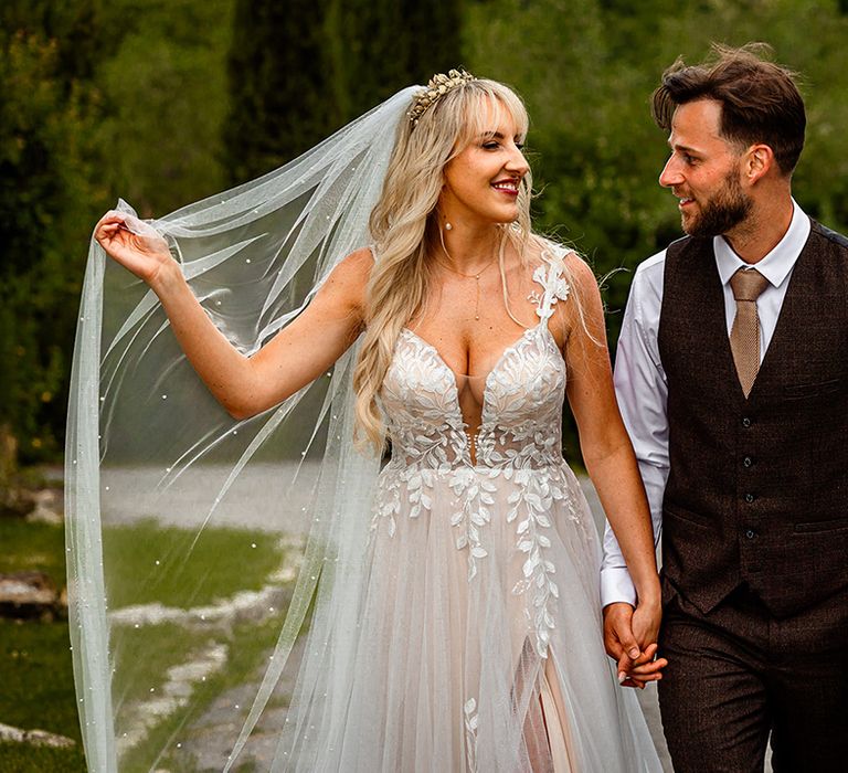 bride-wearing-madi-lane-wedding-dress-and-wedding-veil