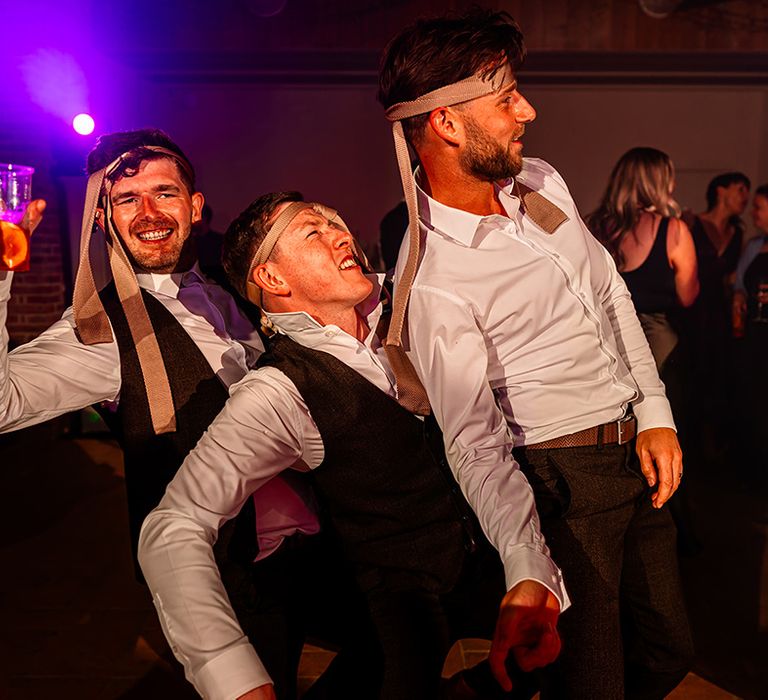 groomsmen-enjoying-the-wedding-reception