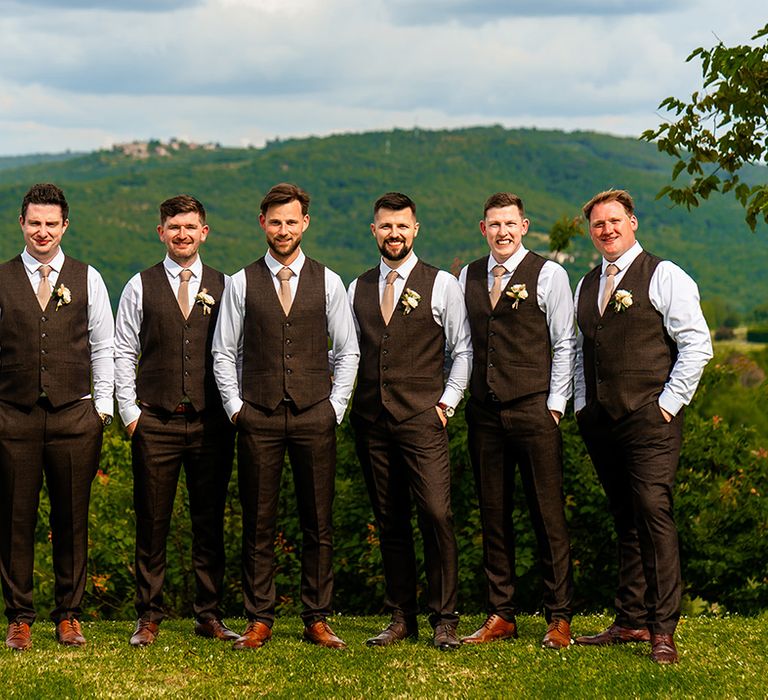 groomsmen-wearing-brown-trousers-and-waistcoats