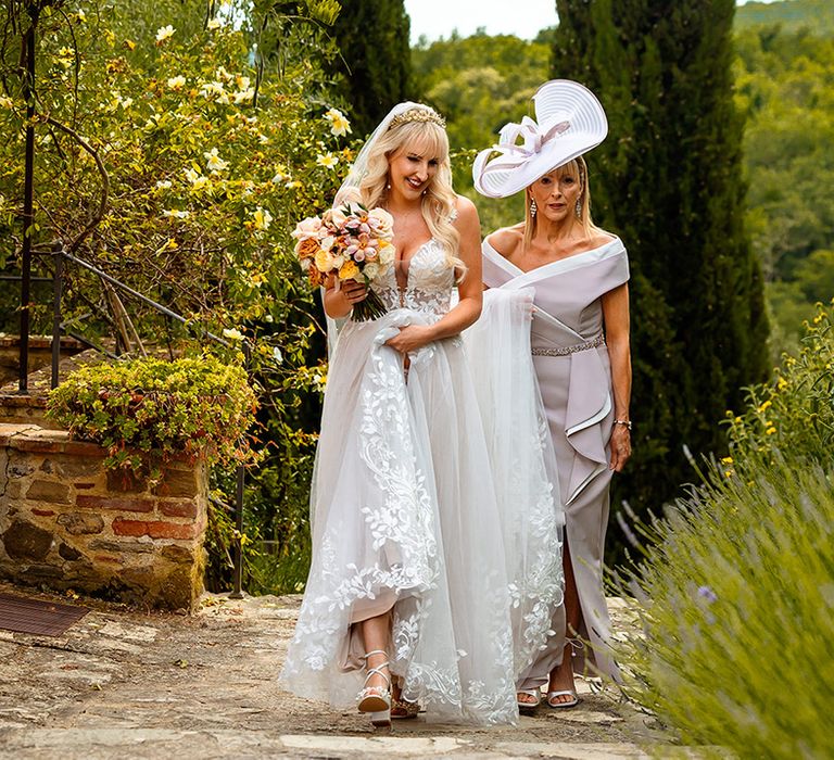 mother-of-the-bride-and-bride-walking-down-the-aisle