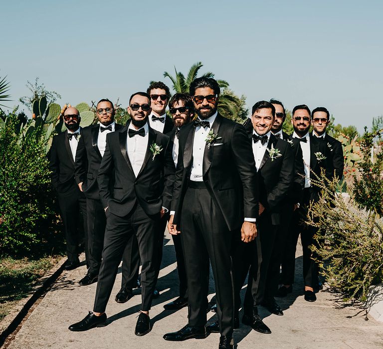 black-tie-wedding-with-groom-and-groomsmen-in-black-tuxedos