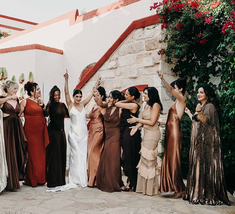 bridal-party-wearing-mismatched-bridesmaid-dresses