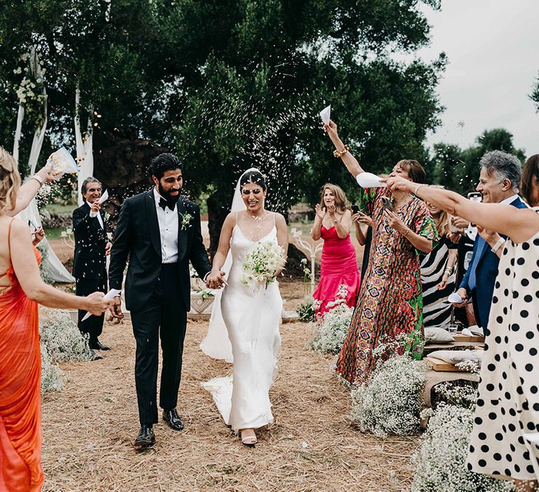 bride-and-groom-exit-to-confetti