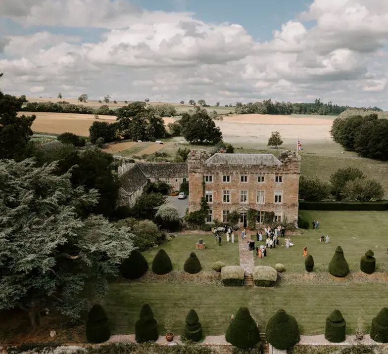 view of wedding venue exterior and gardens at affordable wedding venue in the lake district