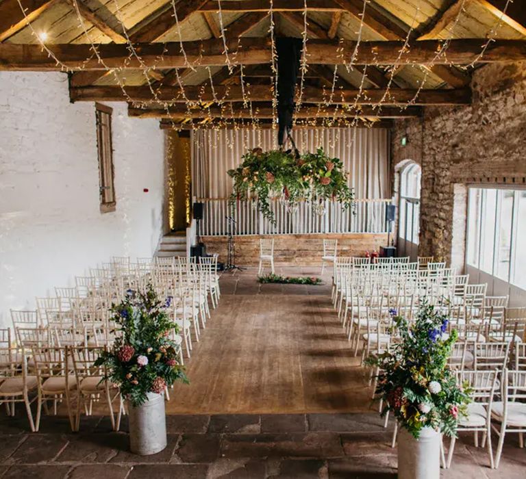 indoor ceremony area at affordable wedding venue, askham hall