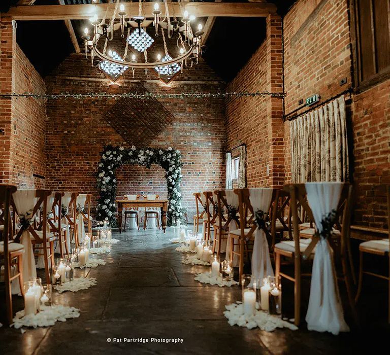 indoor ceremony area at affordable wedding venue, curradine barns