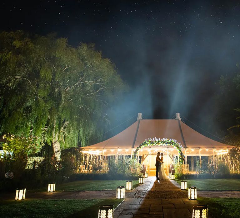 couple at their evening wedding reception at houchins, affordable wedding venue in essex